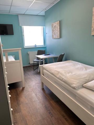 Zweibettzimmer mit Gemeinschaftsbad